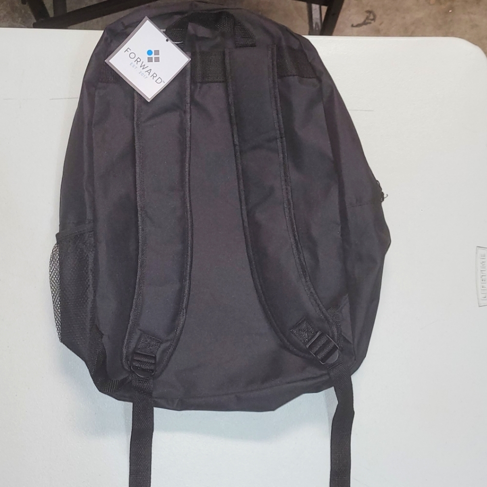 Backpack filled with school supplies - Picture 3 of 4